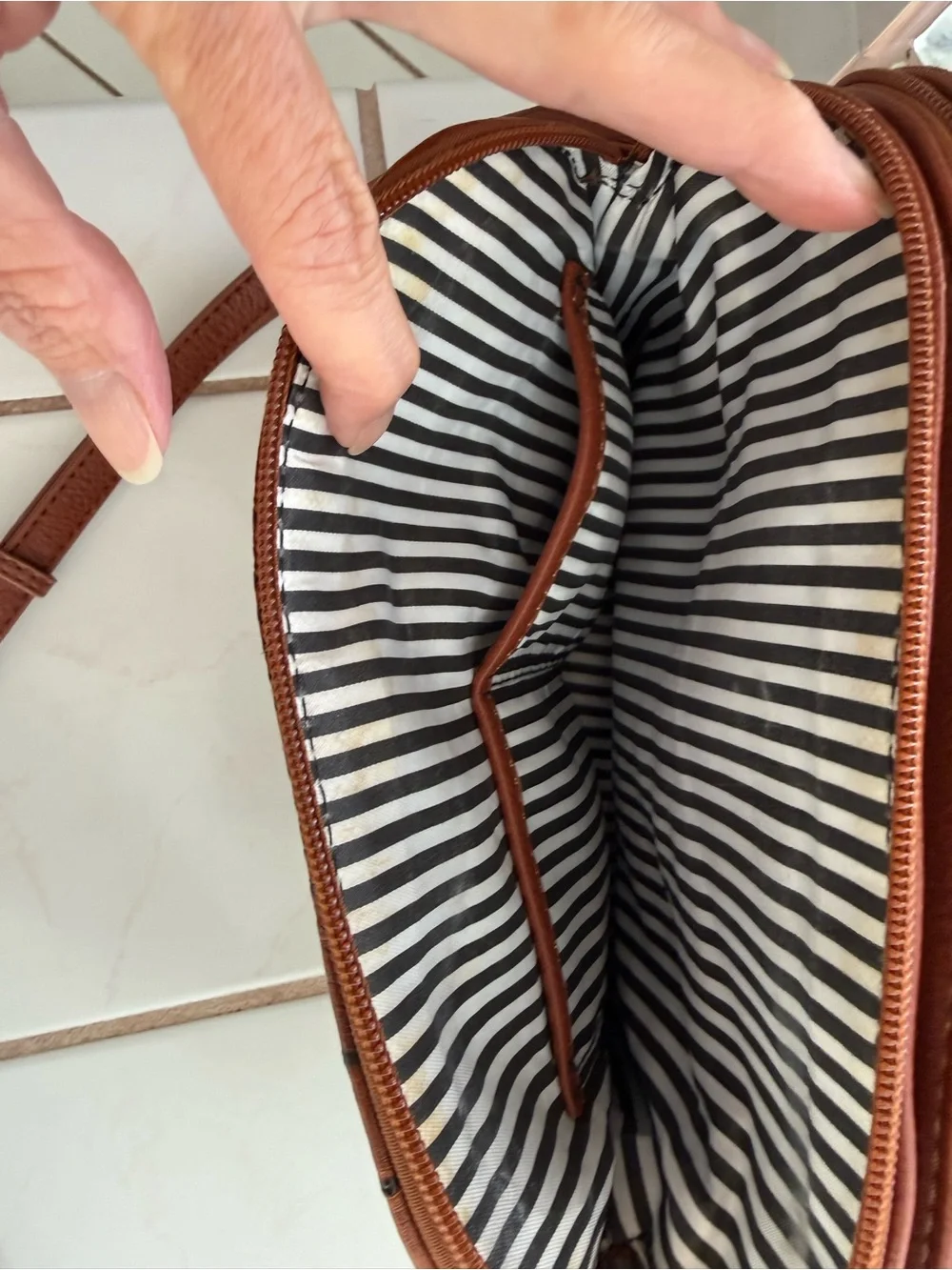 Women's Brown Crossbody Bag with Crock Print & Tassel Zip Pocket